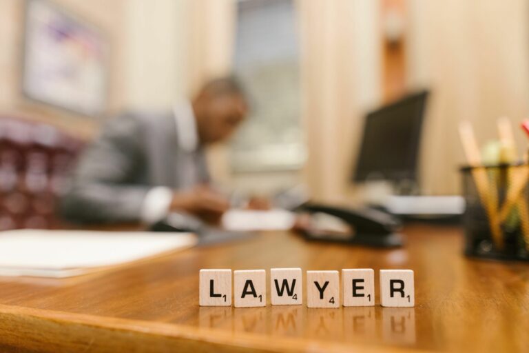 Close-Up Shot of Scrabble Tiles on a Table